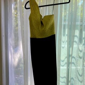 Black and gold one shoulder evening gown. Size 4. Worn once. Perfect condition.